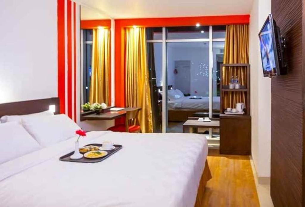 Redstar Hotel Jakarta Extérieur photo